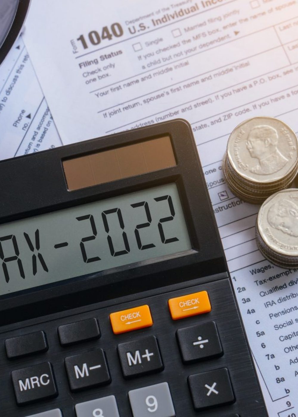 tax-word-and-2022-number-on-calculator-pay-tax-or-vat-in-2022-years-business-and-tax-concept--e1670796158401.jpg